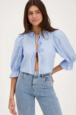 Blouse Bleue Avec Nœuds Et Col à Volants