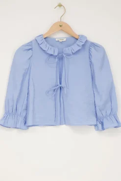 Blouse Bleue Avec Nœuds Et Col à Volants