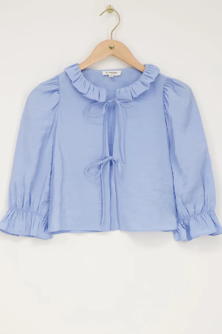 Blouse Bleue Avec Nœuds Et Col à Volants