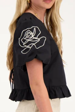 Blouse Noire à Motifs Fleuris Et Nœuds Dans Le Dos
