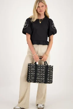 Blouse Noire à Motifs Fleuris Et Nœuds Dans Le Dos
