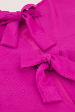 Blouse Rose Avec Manches Plissées Et Nœuds