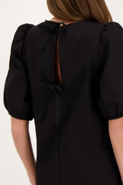 Robe Noire Avec Nœuds Et Manches Bouffantes