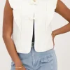 Veste Sans Manches Blanche Avec Nœuds Et Volants