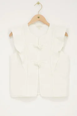 Veste Sans Manches Blanche Avec Nœuds Et Volants