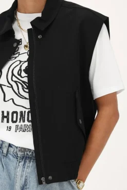 Veste Sans Manches Noire Avec Col Et Poches