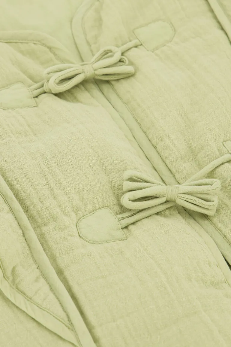 Veste Sans Manches Verte Avec Nœuds Et Volants